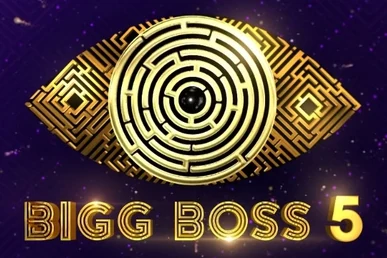 Bigg Boss Telugu 5 logo, the show's eye at the centre of a golden maze