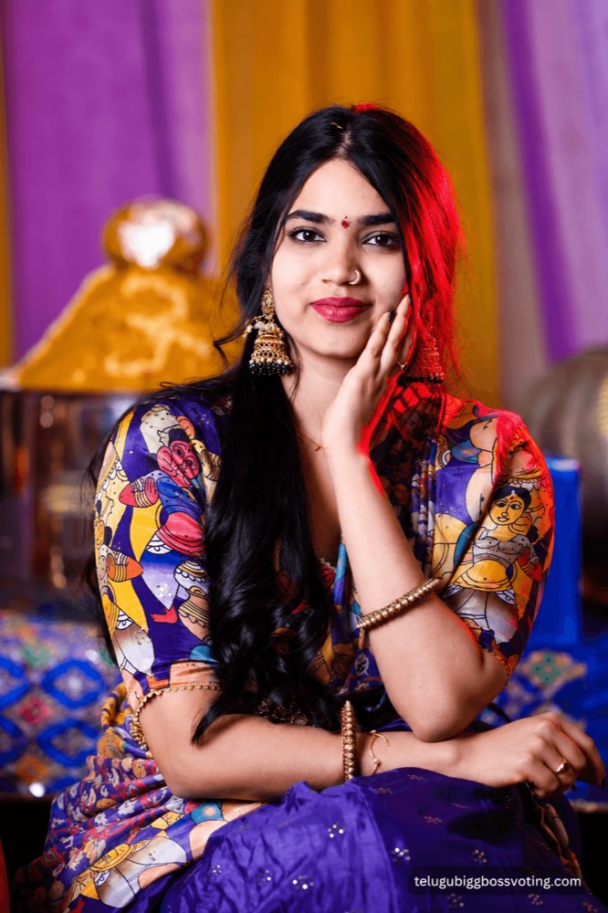 Illustrated portrait of Shalini Damera in a purple saree with a kalamkari-print blouse and jhumka earrings